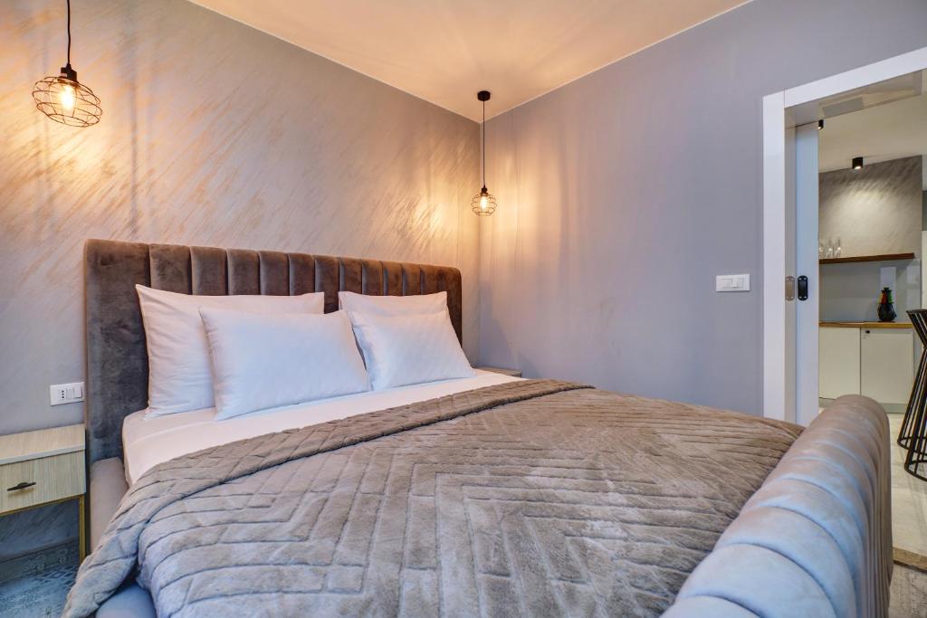 Posteľ alebo postele v izbe v ubytovaní Luxury apartments