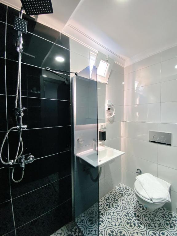 Koupelna v ubytování Nefis Hotel City