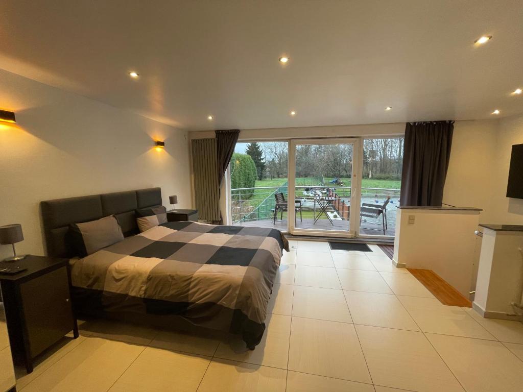 Postel nebo postele na pokoji v ubytování B&B groot-bijgaarden center