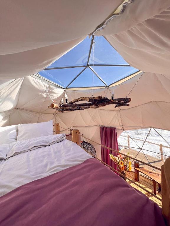 Postel nebo postele na pokoji v ubytování Glamping Park
