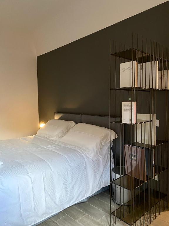 A bed or beds in a room at La suite aquilana