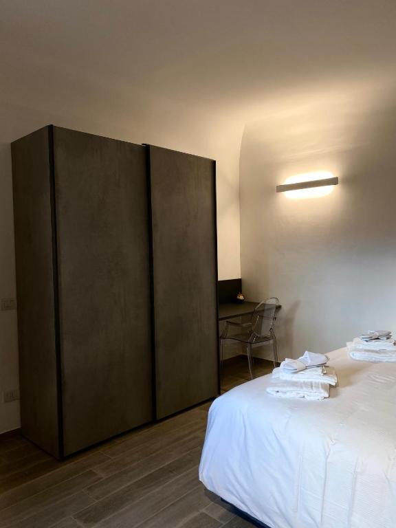 A bed or beds in a room at La suite aquilana