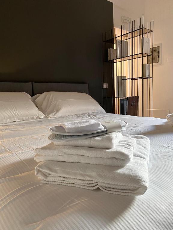 A bed or beds in a room at La suite aquilana