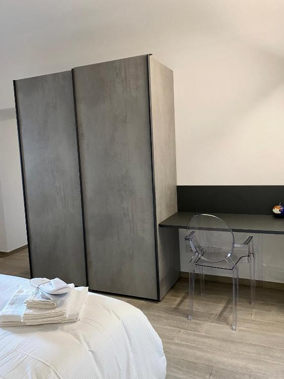 A bed or beds in a room at La suite aquilana