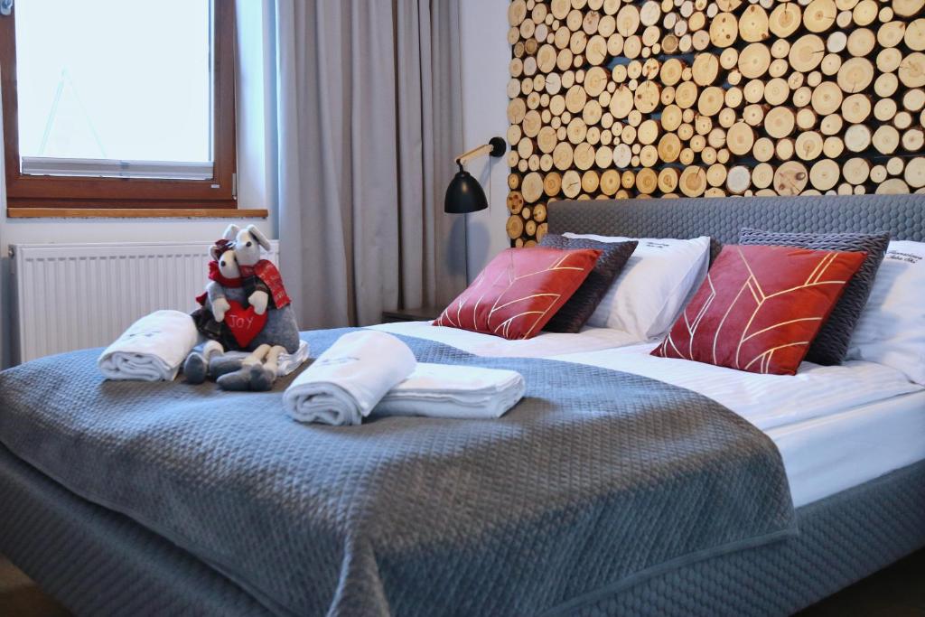 Posteľ alebo postele v izbe v ubytovaní Harnasiowa Izba Ski - Polana Szymoszkowa Ski Resort Zakopane