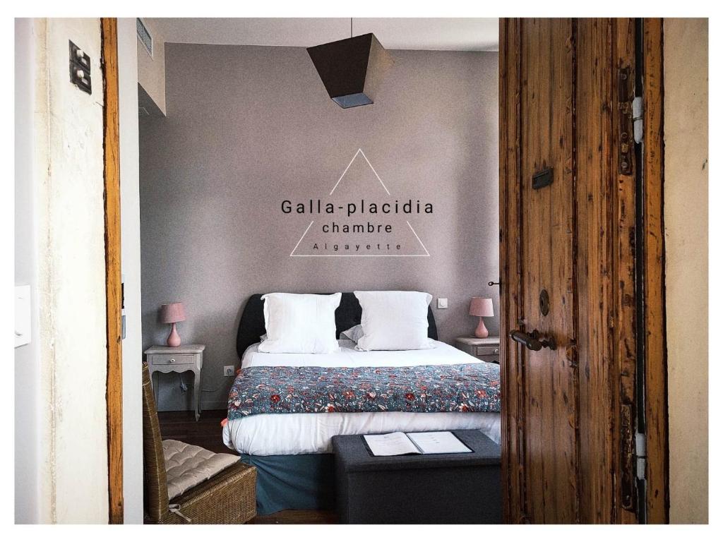 Postel nebo postele na pokoji v ubytování Hotel Galla Placidia