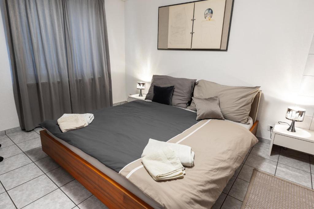 Ein Bett oder Betten in einem Zimmer der Unterkunft Hotel Römerhof