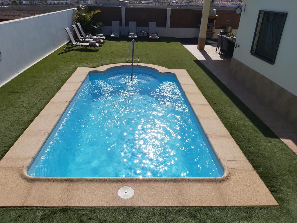 Bazén v ubytování Villa Thais, private heated pool, ideal for your holidays in Caleta de Fuste nebo v jeho okolí