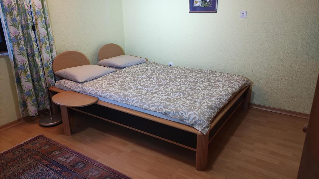 Postel nebo postele na pokoji v ubytování Alp House