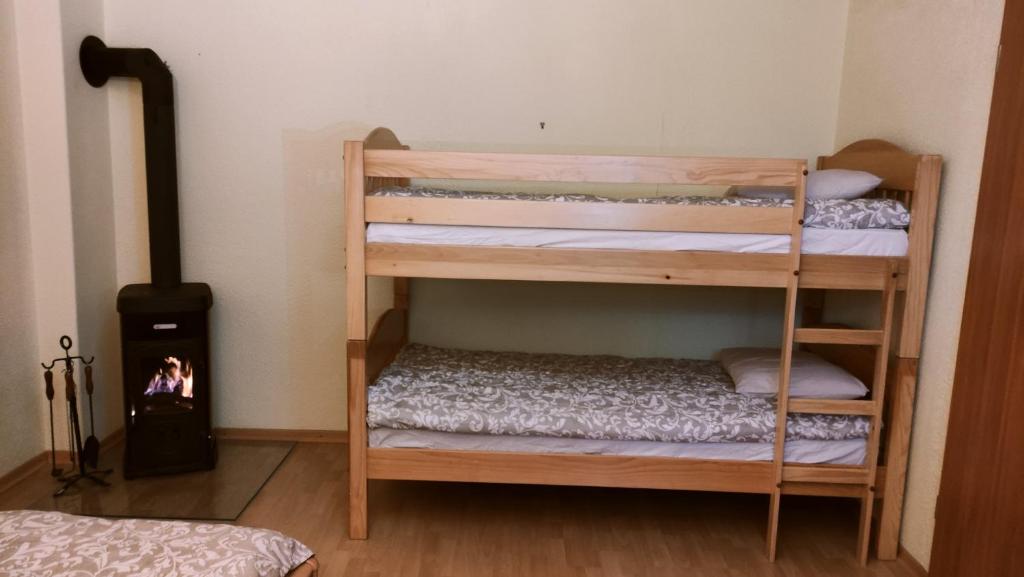 Postel nebo postele na pokoji v ubytování Alp House