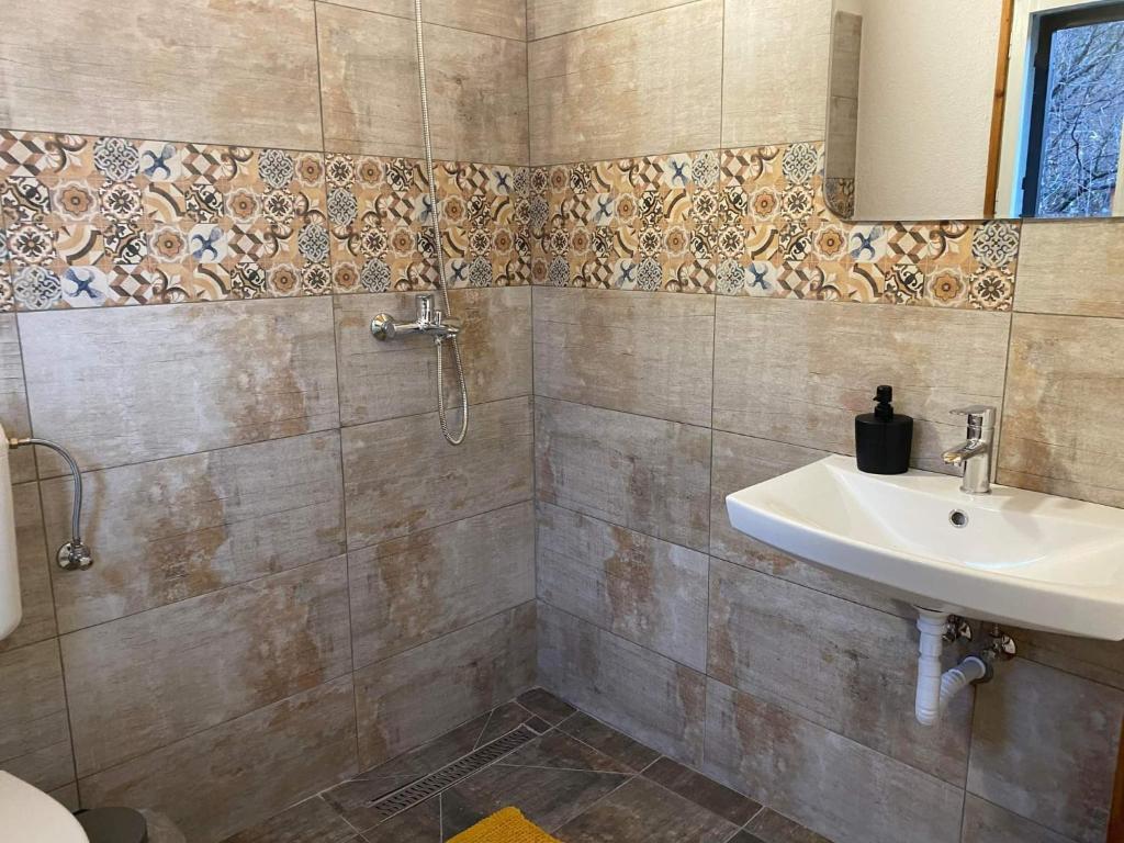 Koupelna v ubytování Casa Bucataria Fonix