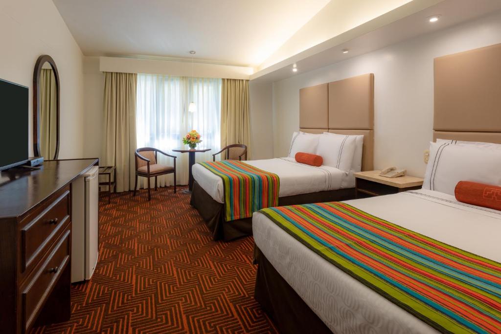 Cama ou camas em um quarto em Sonesta Posadas del Inca Puno