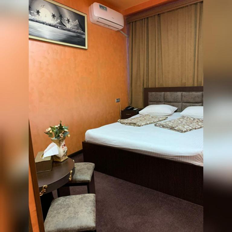 Postel nebo postele na pokoji v ubytování HOTEL N1