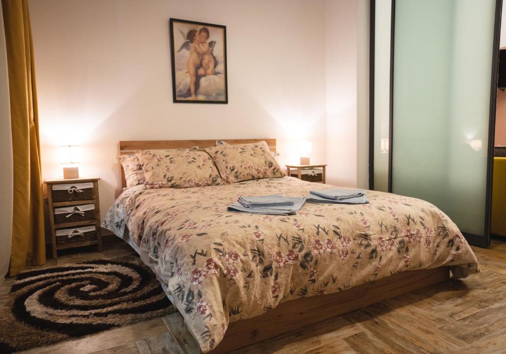 Postel nebo postele na pokoji v ubytování Olive Tree Suites