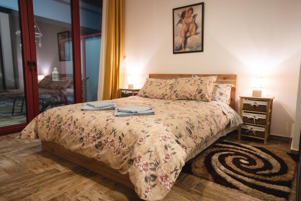 Postel nebo postele na pokoji v ubytování Olive Tree Suites
