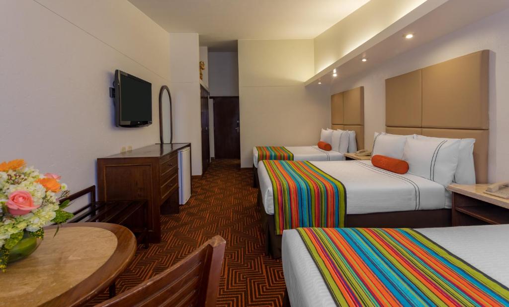Cama ou camas em um quarto em Sonesta Posadas del Inca Puno