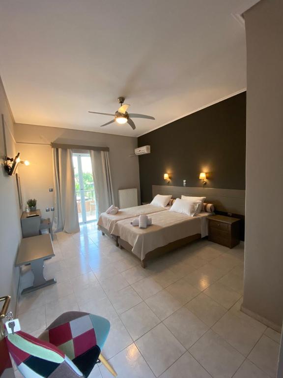 Posteľ alebo postele v izbe v ubytovaní Filoxenia Luxury Studios & Apartments