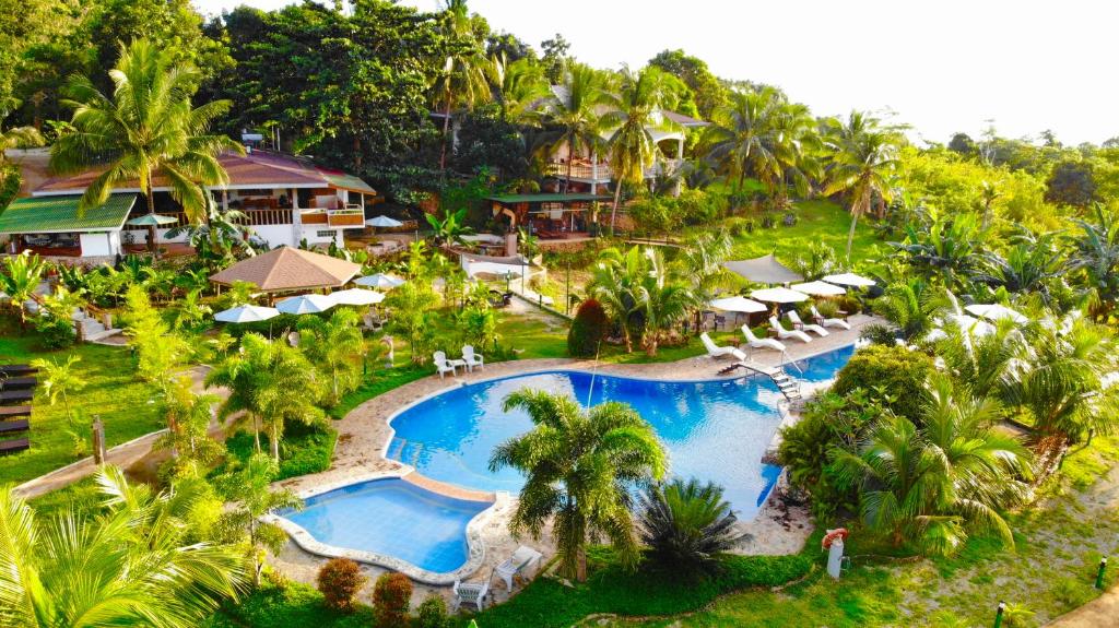 an aerial view of a resort with a swimming pool at South Mountain Resort in Siquijor
