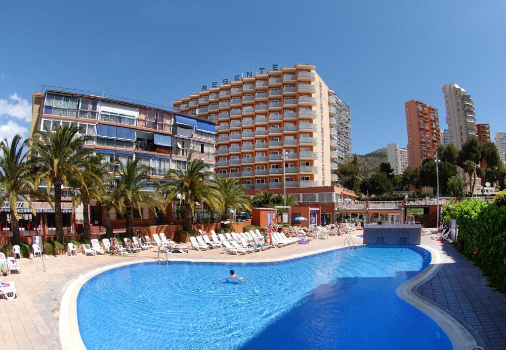 a hotel room with a large swimming pool at Medplaya Hotel Regente in Benidorm