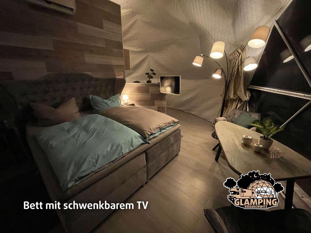 Postel nebo postele na pokoji v ubytování Glamping Krauschwitz