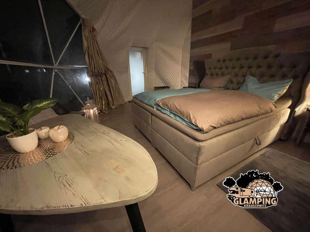 Postel nebo postele na pokoji v ubytování Glamping Krauschwitz