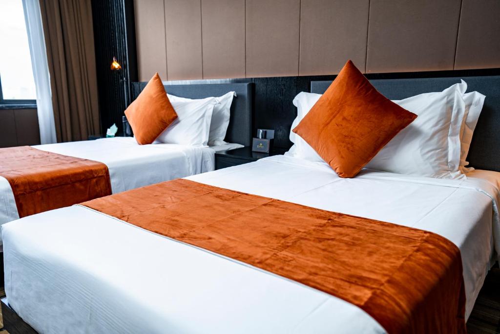 Postel nebo postele na pokoji v ubytování OCEAN HOTEL