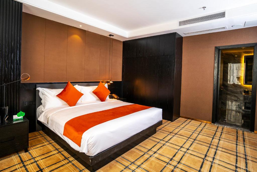 Postel nebo postele na pokoji v ubytování OCEAN HOTEL