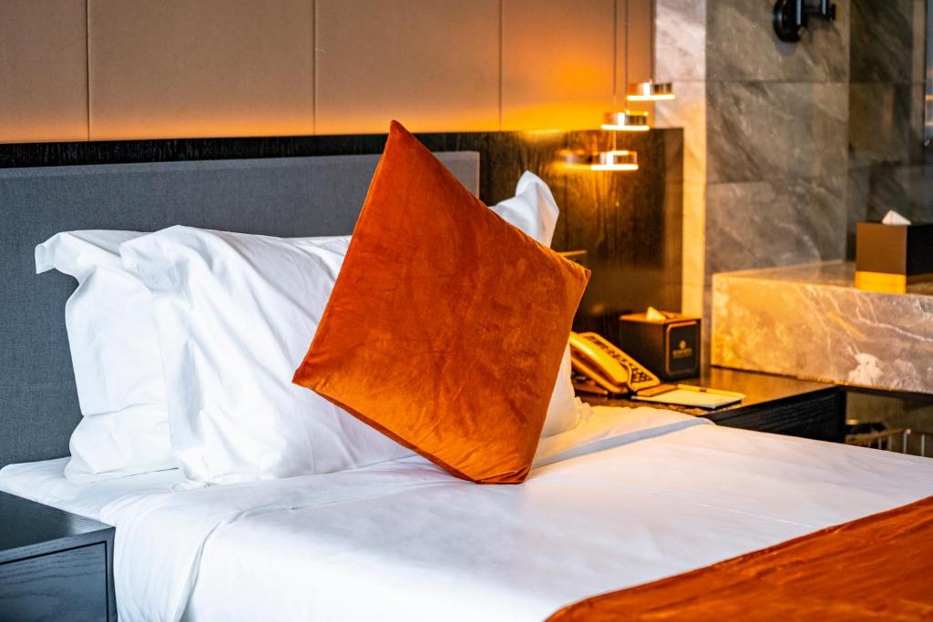 Postel nebo postele na pokoji v ubytování OCEAN HOTEL