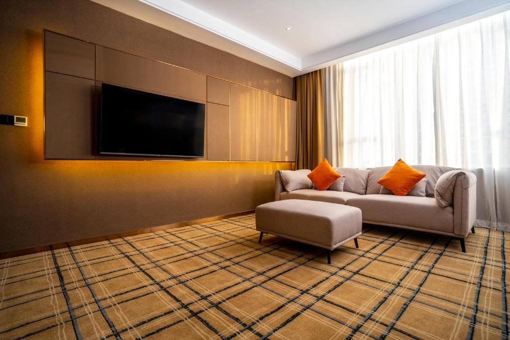 TV a/nebo společenská místnost v ubytování OCEAN HOTEL