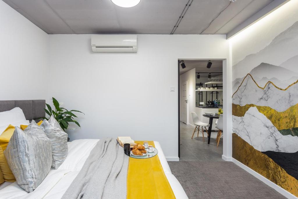 Posteľ alebo postele v izbe v ubytovaní Family Center Apartments