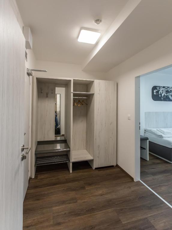 Postel nebo postele na pokoji v ubytování Hotel Garni VŠB TUO