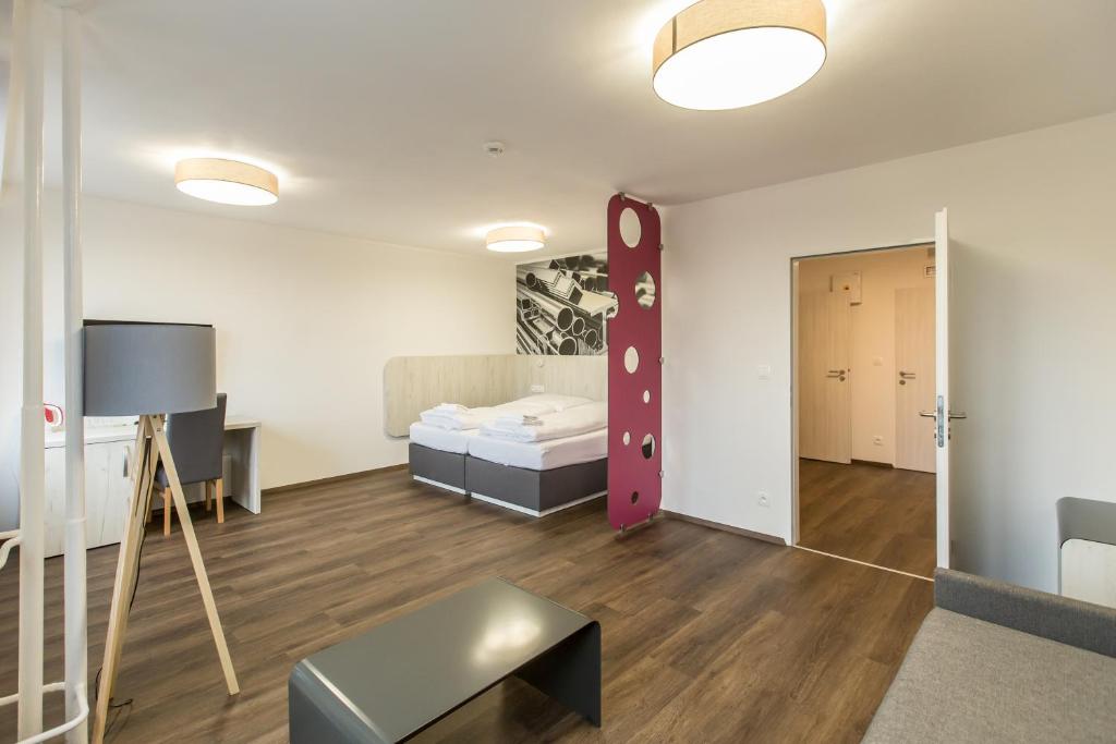 Postel nebo postele na pokoji v ubytování Hotel Garni VŠB TUO