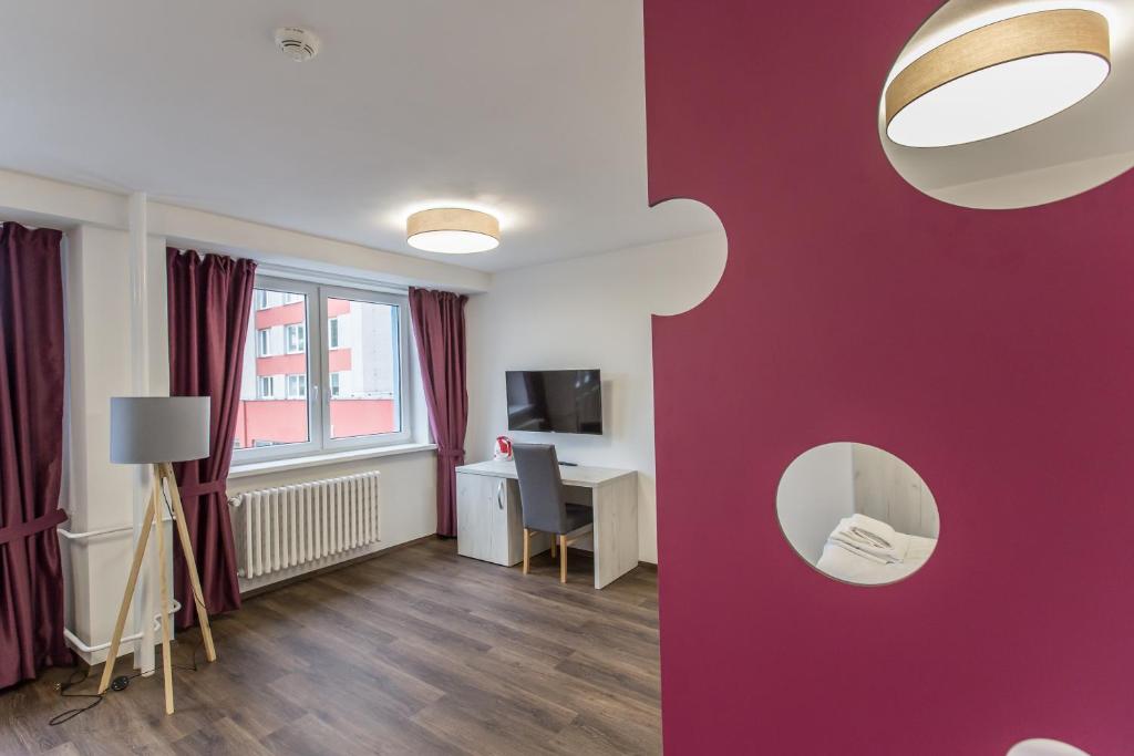 TV a/nebo společenská místnost v ubytování Hotel Garni VŠB TUO
