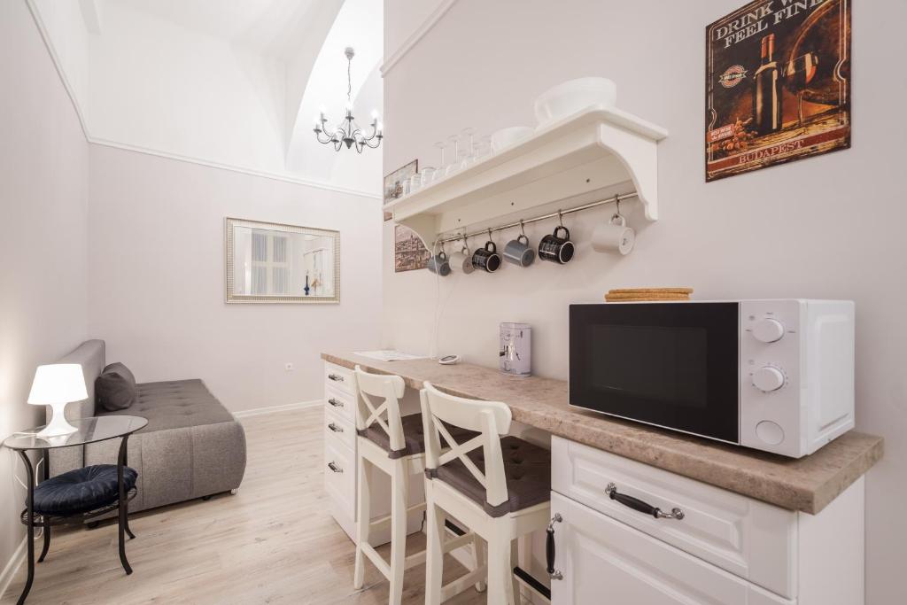 Televízia a/alebo spoločenská miestnosť v ubytovaní BpR Waldorf Wooden Home