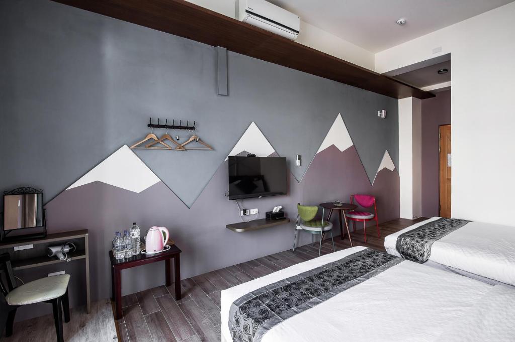 Postel nebo postele na pokoji v ubytování Toutsu Asami Guest House