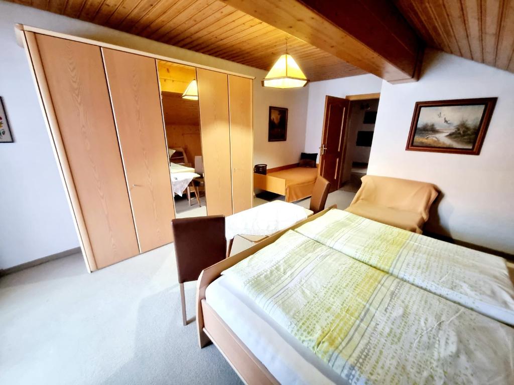Postel nebo postele na pokoji v ubytování Guesthouse Schoba Typ D