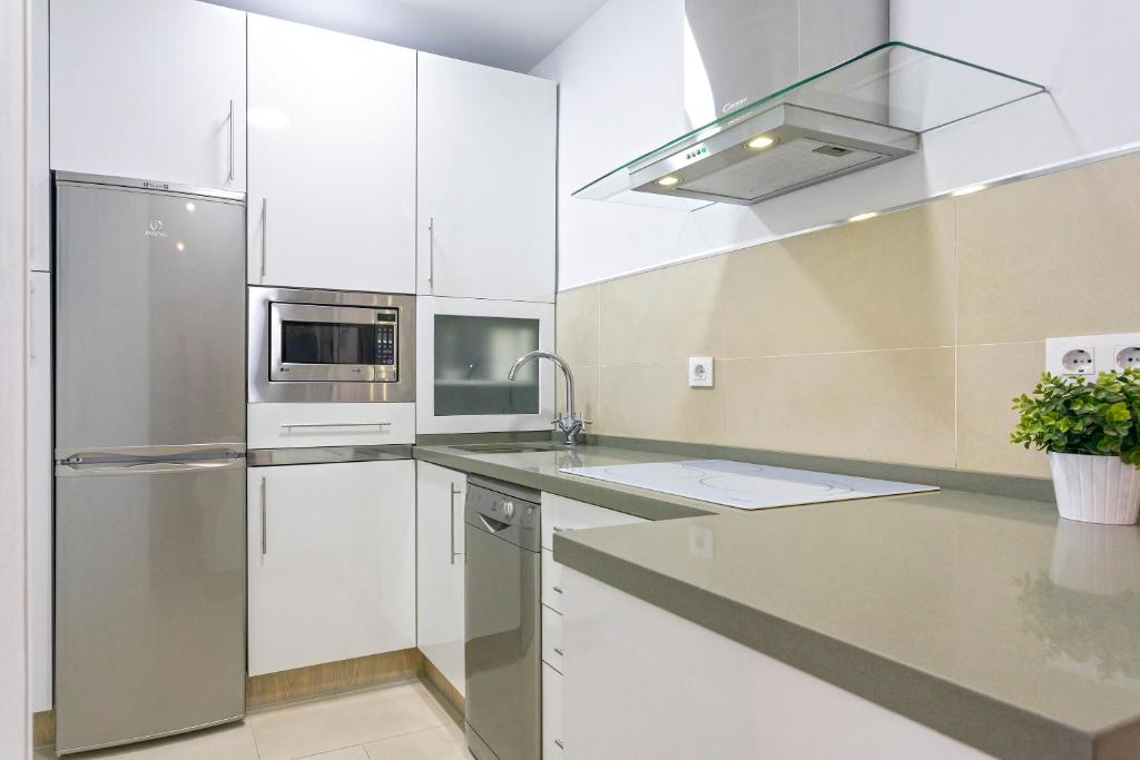 Kuchyňa alebo kuchynka v ubytovaní Genteel Home Santa Marta