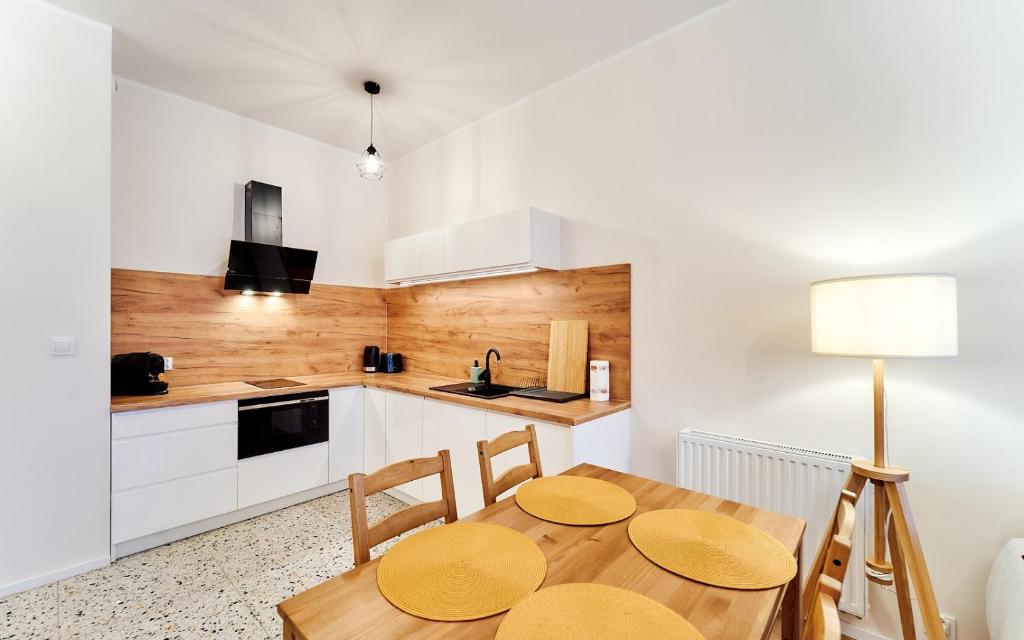 Kuchyňa alebo kuchynka v ubytovaní LAGUNA Apartament Polanica Residence 5
