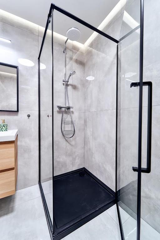 Kúpeľňa v ubytovaní LAGUNA Apartament Polanica Residence 5