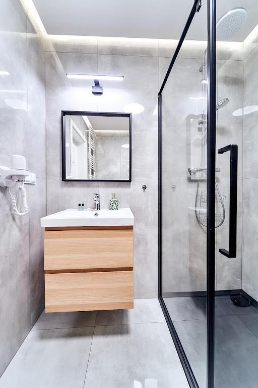 Kúpeľňa v ubytovaní LAGUNA Apartament Polanica Residence 5