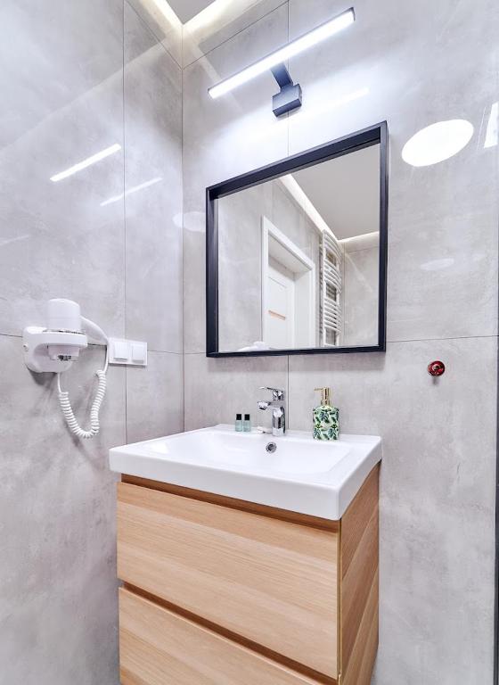Kúpeľňa v ubytovaní LAGUNA Apartament Polanica Residence 5