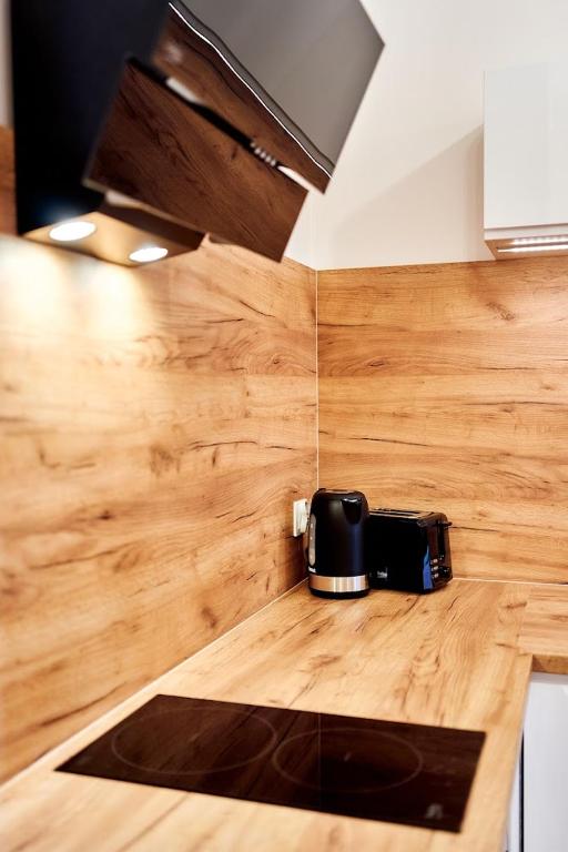 Kuchyňa alebo kuchynka v ubytovaní LAGUNA Apartament Polanica Residence 5