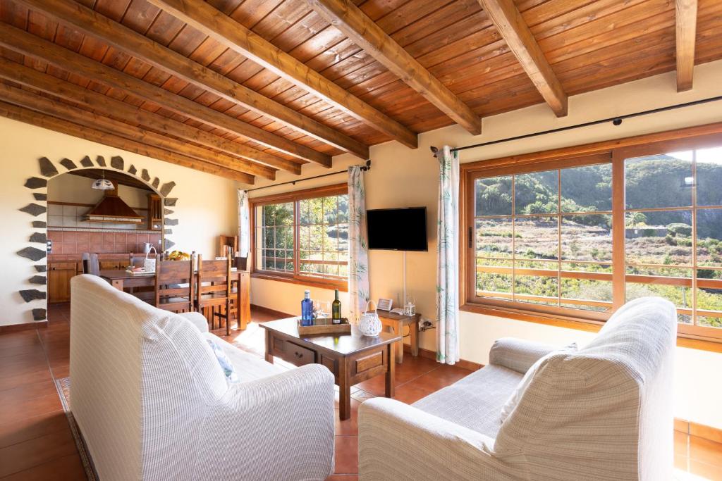 A television and/or entertainment centre at Home2Book Las Mimbreras