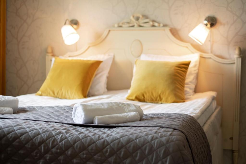 Katil atau katil-katil dalam bilik di IK Rooms & Camping