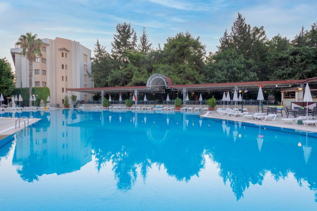 The swimming pool at or close to Armas Kaplan Paradise