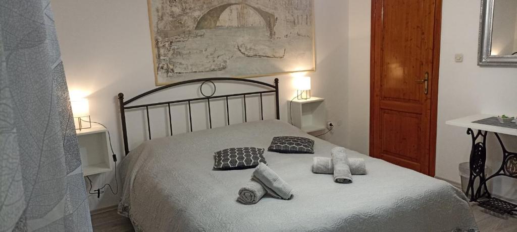 Кровать или кровати в номере Rooms Barbieri Rovinj