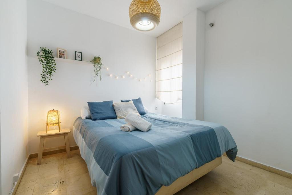 Posteľ alebo postele v izbe v ubytovaní PUERTA DEL MAR APARTMENT
