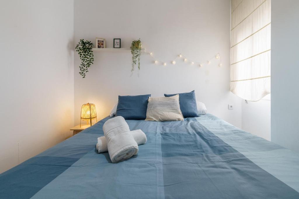 Posteľ alebo postele v izbe v ubytovaní PUERTA DEL MAR APARTMENT