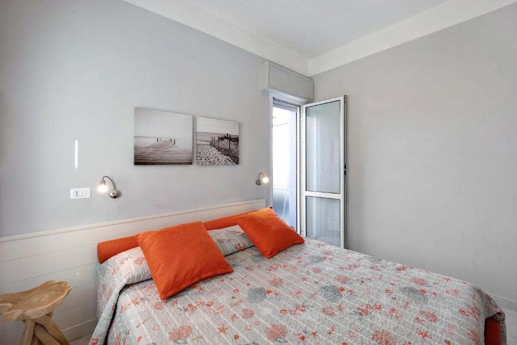 En eller flere senge i et værelse på Victoria Apartments Mediterraneo