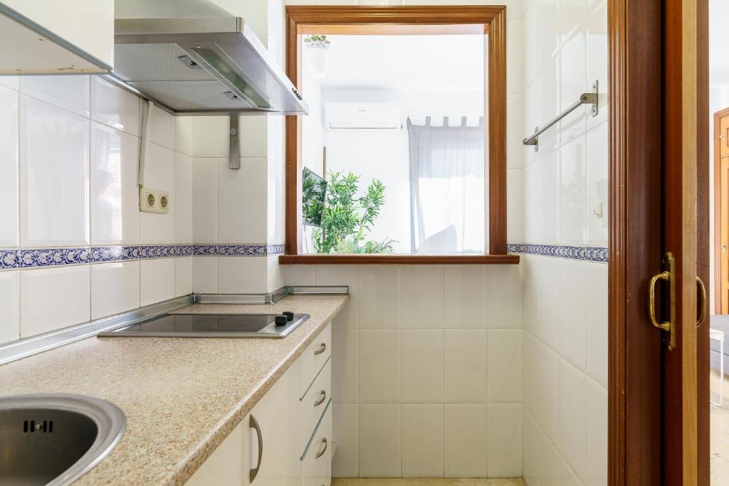 Kuchyňa alebo kuchynka v ubytovaní PUERTA DEL MAR APARTMENT